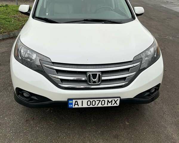 Белый Хонда СРВ, объемом двигателя 2.36 л и пробегом 124 тыс. км за 15200 $, фото 1 на Automoto.ua