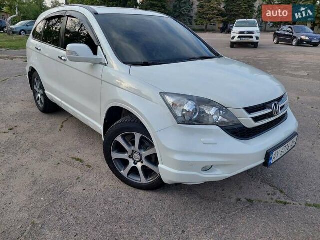 Белый Хонда СРВ, объемом двигателя 2.35 л и пробегом 146 тыс. км за 15400 $, фото 1 на Automoto.ua