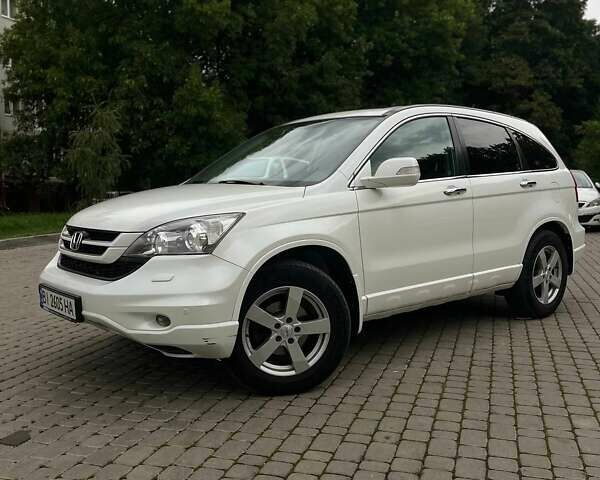 Белый Хонда СРВ, объемом двигателя 2.4 л и пробегом 255 тыс. км за 13200 $, фото 1 на Automoto.ua