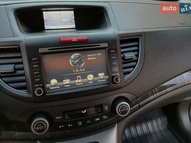 Белый Хонда СРВ, объемом двигателя 2.35 л и пробегом 108 тыс. км за 18600 $, фото 1 на Automoto.ua