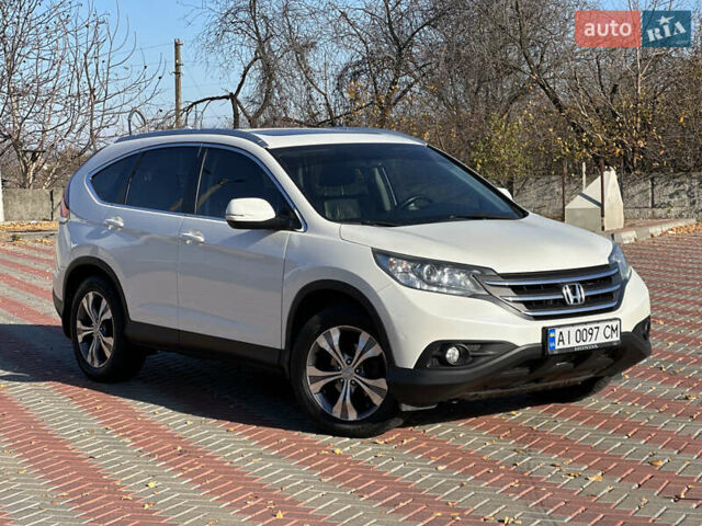 Белый Хонда СРВ, объемом двигателя 2.35 л и пробегом 200 тыс. км за 16800 $, фото 1 на Automoto.ua