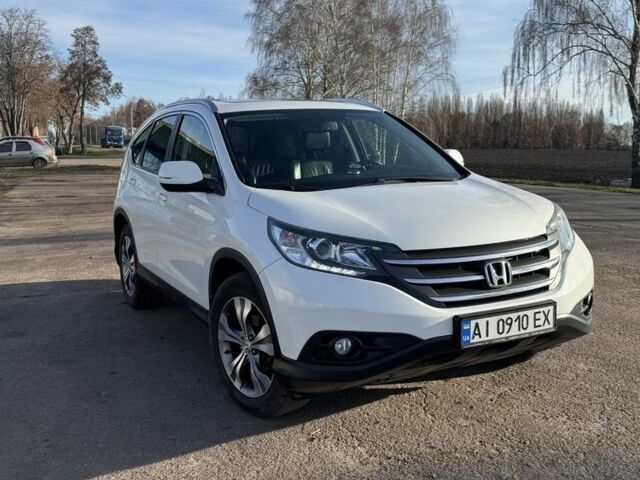 Белый Хонда СРВ, объемом двигателя 2.4 л и пробегом 179 тыс. км за 15900 $, фото 1 на Automoto.ua