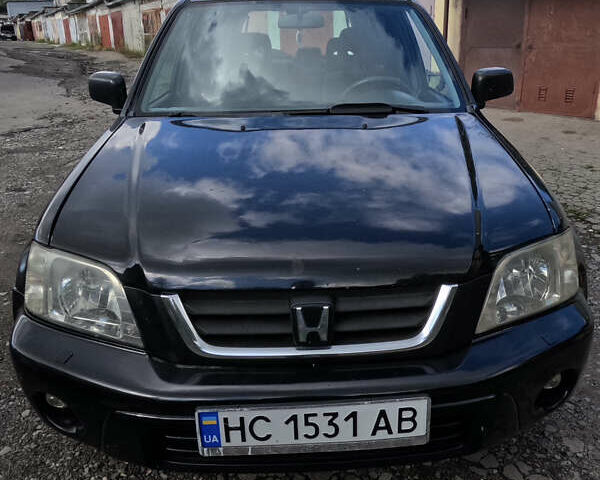 Черный Хонда СРВ, объемом двигателя 2 л и пробегом 314 тыс. км за 5500 $, фото 1 на Automoto.ua