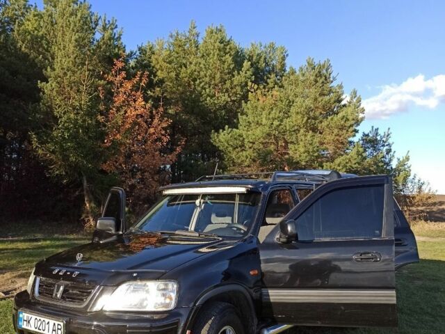 Черный Хонда СРВ, объемом двигателя 2 л и пробегом 278 тыс. км за 6000 $, фото 1 на Automoto.ua