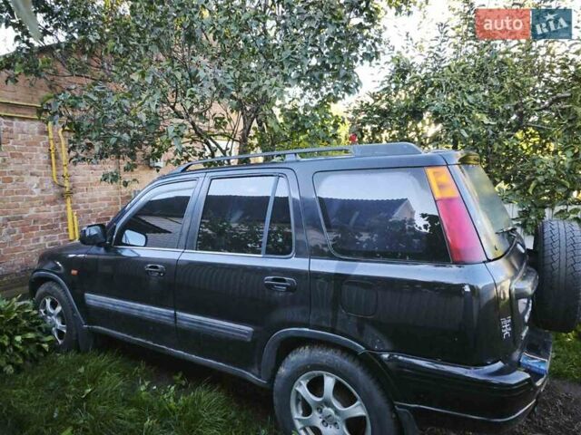 Черный Хонда СРВ, объемом двигателя 2 л и пробегом 208 тыс. км за 2800 $, фото 1 на Automoto.ua