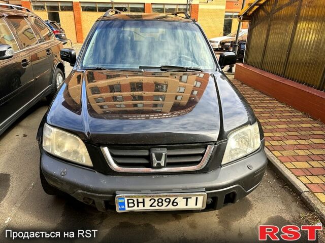 Черный Хонда СРВ, объемом двигателя 2 л и пробегом 222 тыс. км за 4000 $, фото 1 на Automoto.ua