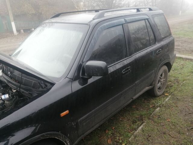 Черный Хонда СРВ, объемом двигателя 2 л и пробегом 270 тыс. км за 6000 $, фото 1 на Automoto.ua