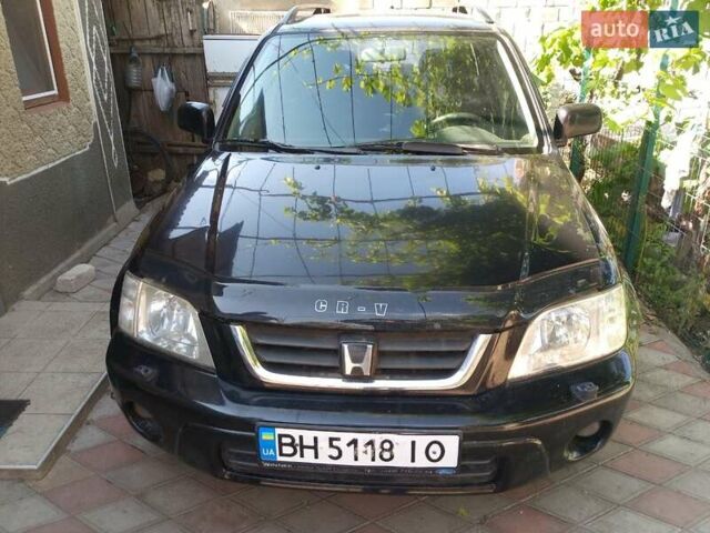 Черный Хонда СРВ, объемом двигателя 2 л и пробегом 299 тыс. км за 4999 $, фото 1 на Automoto.ua