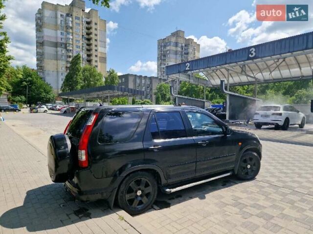 Чорний Хонда СРВ, об'ємом двигуна 2 л та пробігом 268 тис. км за 6500 $, фото 1 на Automoto.ua