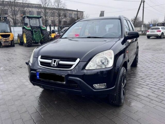 Черный Хонда СРВ, объемом двигателя 2 л и пробегом 350 тыс. км за 3900 $, фото 1 на Automoto.ua