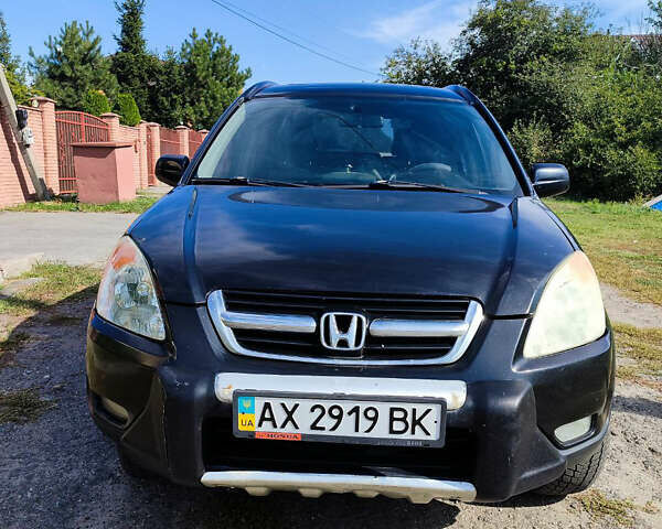 Черный Хонда СРВ, объемом двигателя 2 л и пробегом 268 тыс. км за 5300 $, фото 1 на Automoto.ua