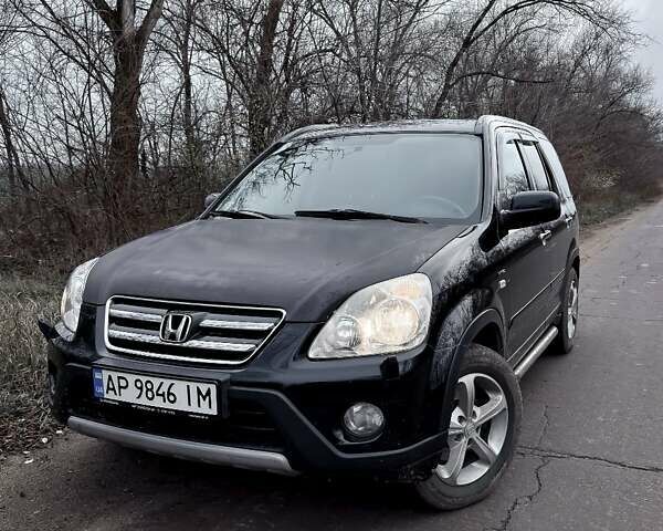 Черный Хонда СРВ, объемом двигателя 2 л и пробегом 297 тыс. км за 6200 $, фото 1 на Automoto.ua