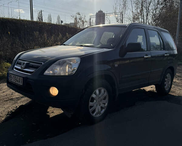 Черный Хонда СРВ, объемом двигателя 2.2 л и пробегом 251 тыс. км за 3000 $, фото 1 на Automoto.ua