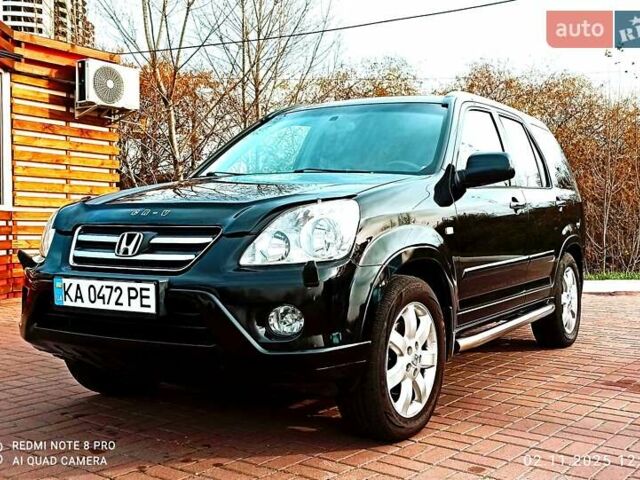 Черный Хонда СРВ, объемом двигателя 2 л и пробегом 186 тыс. км за 10000 $, фото 1 на Automoto.ua