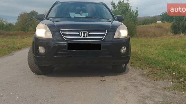 Черный Хонда СРВ, объемом двигателя 2.2 л и пробегом 302 тыс. км за 4600 $, фото 1 на Automoto.ua