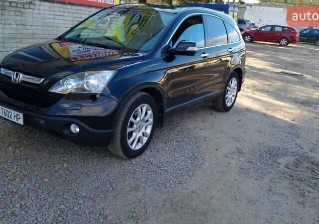 Черный Хонда СРВ, объемом двигателя 2.2 л и пробегом 310 тыс. км за 10950 $, фото 1 на Automoto.ua