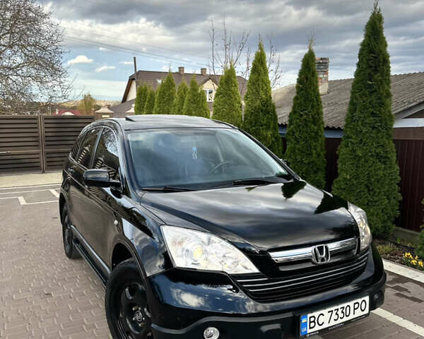 Черный Хонда СРВ, объемом двигателя 2.4 л и пробегом 257 тыс. км за 7950 $, фото 1 на Automoto.ua