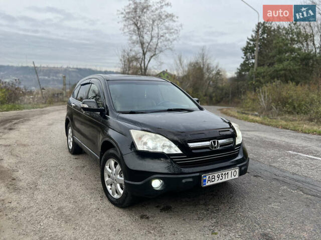 Черный Хонда СРВ, объемом двигателя 2.35 л и пробегом 325 тыс. км за 10200 $, фото 1 на Automoto.ua