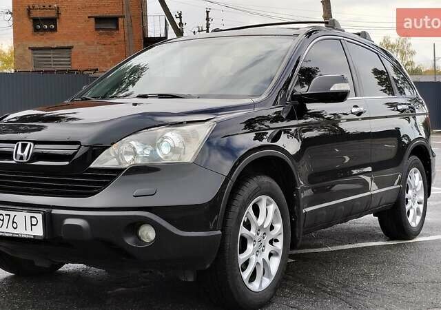 Черный Хонда СРВ, объемом двигателя 2 л и пробегом 241 тыс. км за 9950 $, фото 1 на Automoto.ua