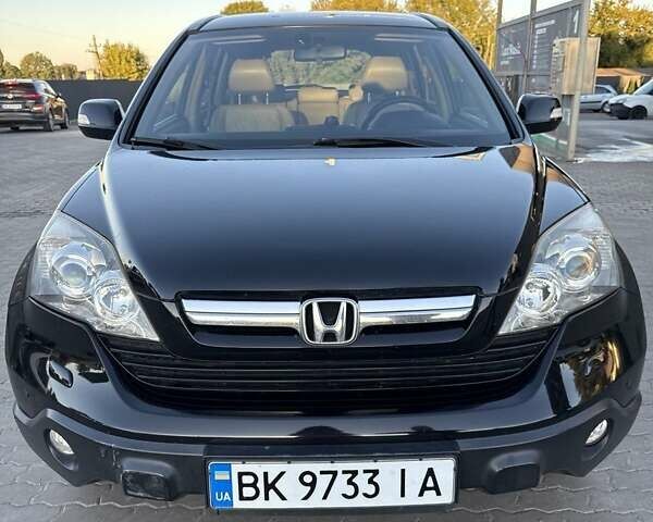Черный Хонда СРВ, объемом двигателя 2 л и пробегом 172 тыс. км за 10500 $, фото 1 на Automoto.ua