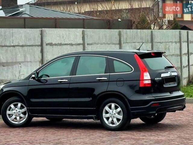 Чорний Хонда СРВ, об'ємом двигуна 2.4 л та пробігом 164 тис. км за 10900 $, фото 1 на Automoto.ua