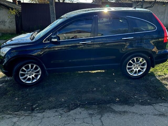 Черный Хонда СРВ, объемом двигателя 2.4 л и пробегом 133 тыс. км за 9999 $, фото 1 на Automoto.ua