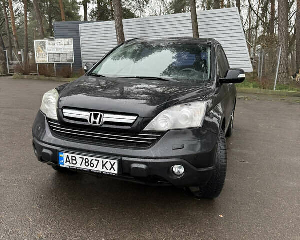 Черный Хонда СРВ, объемом двигателя 2.4 л и пробегом 235 тыс. км за 10500 $, фото 1 на Automoto.ua