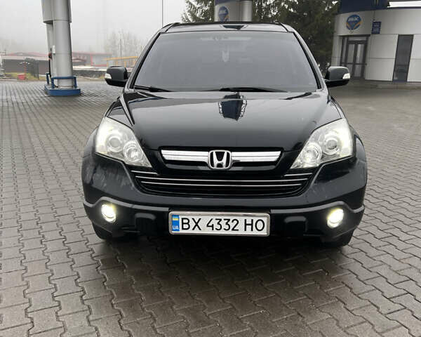 Черный Хонда СРВ, объемом двигателя 2.35 л и пробегом 230 тыс. км за 10400 $, фото 1 на Automoto.ua