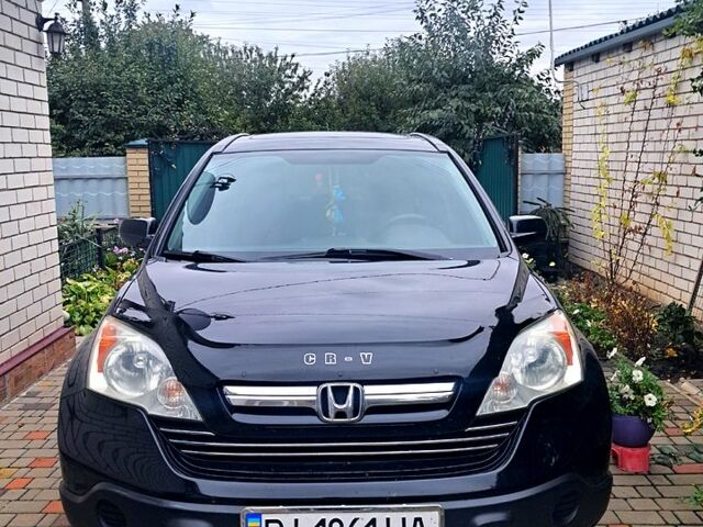 Черный Хонда СРВ, объемом двигателя 2.4 л и пробегом 160 тыс. км за 10500 $, фото 1 на Automoto.ua
