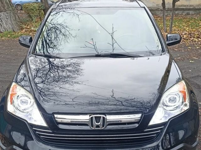 Черный Хонда СРВ, объемом двигателя 2.4 л и пробегом 197 тыс. км за 12000 $, фото 1 на Automoto.ua