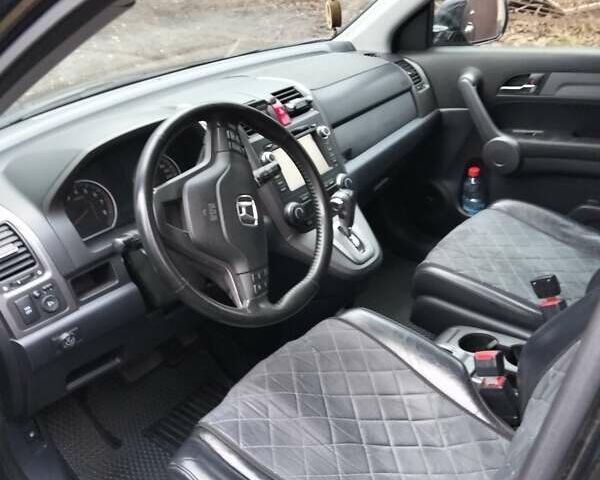 Черный Хонда СРВ, объемом двигателя 2.4 л и пробегом 190 тыс. км за 10500 $, фото 1 на Automoto.ua