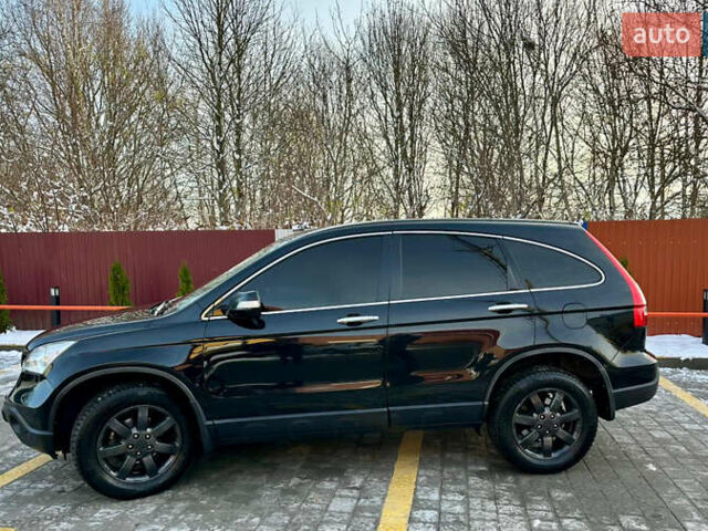 Черный Хонда СРВ, объемом двигателя 2.4 л и пробегом 203 тыс. км за 10400 $, фото 1 на Automoto.ua