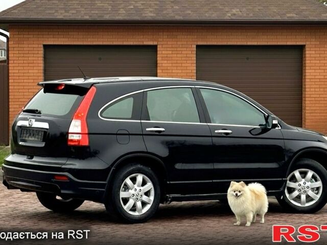 Черный Хонда СРВ, объемом двигателя 2.4 л и пробегом 164 тыс. км за 10900 $, фото 1 на Automoto.ua