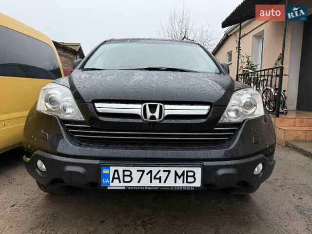 Черный Хонда СРВ, объемом двигателя 2.35 л и пробегом 141 тыс. км за 13000 $, фото 1 на Automoto.ua