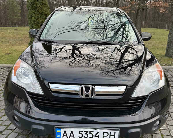 Черный Хонда СРВ, объемом двигателя 2.35 л и пробегом 300 тыс. км за 9700 $, фото 1 на Automoto.ua