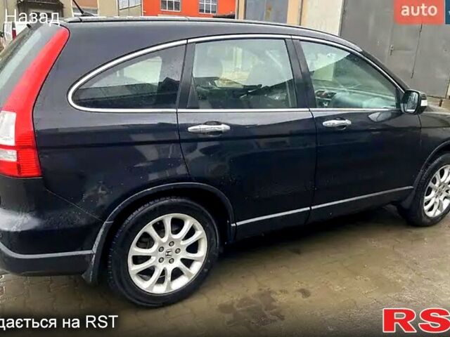 Чорний Хонда СРВ, об'ємом двигуна 2 л та пробігом 252 тис. км за 9800 $, фото 1 на Automoto.ua