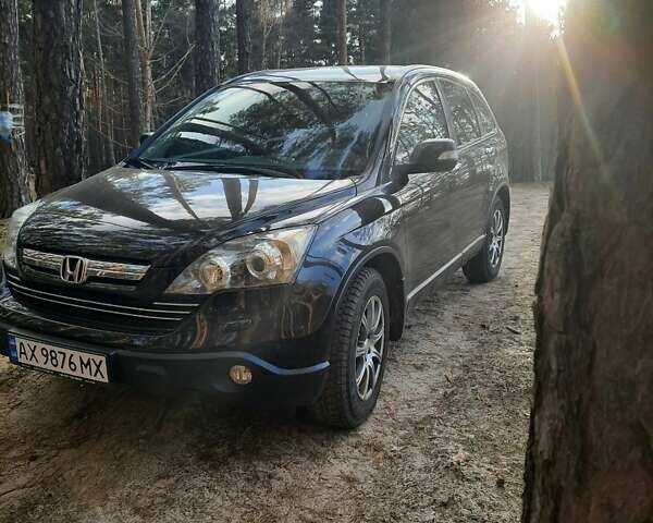 Черный Хонда СРВ, объемом двигателя 2.35 л и пробегом 180 тыс. км за 13700 $, фото 1 на Automoto.ua
