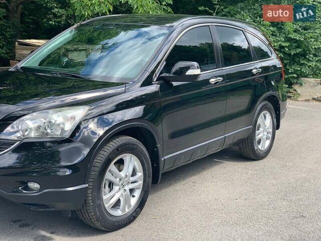 Черный Хонда СРВ, объемом двигателя 2.2 л и пробегом 190 тыс. км за 12900 $, фото 1 на Automoto.ua