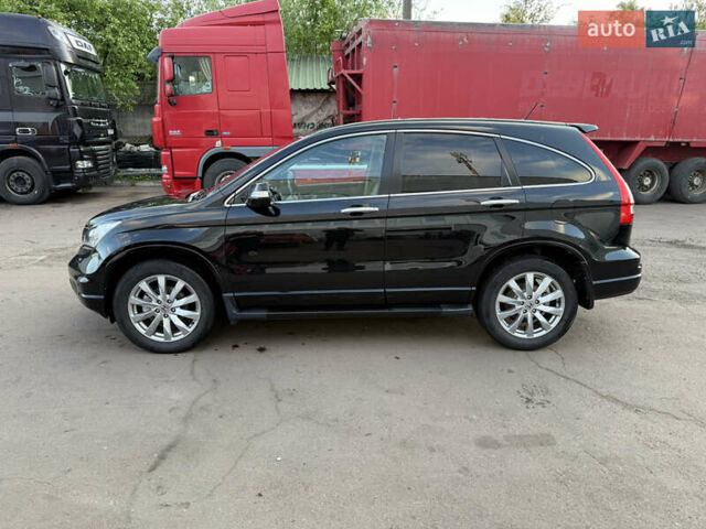 Черный Хонда СРВ, объемом двигателя 2.4 л и пробегом 200 тыс. км за 12500 $, фото 1 на Automoto.ua