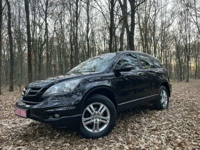 Черный Хонда СРВ, объемом двигателя 2 л и пробегом 220 тыс. км за 12600 $, фото 1 на Automoto.ua