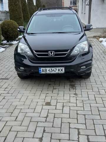 Черный Хонда СРВ, объемом двигателя 2.2 л и пробегом 224 тыс. км за 15900 $, фото 1 на Automoto.ua