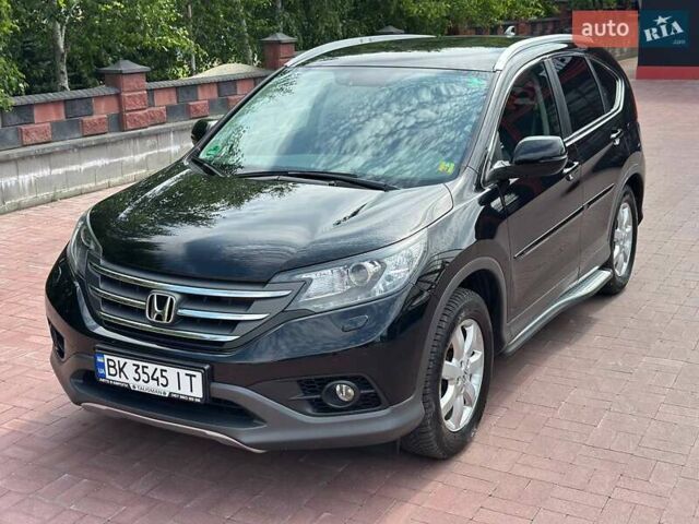Черный Хонда СРВ, объемом двигателя 2.2 л и пробегом 181 тыс. км за 18100 $, фото 1 на Automoto.ua