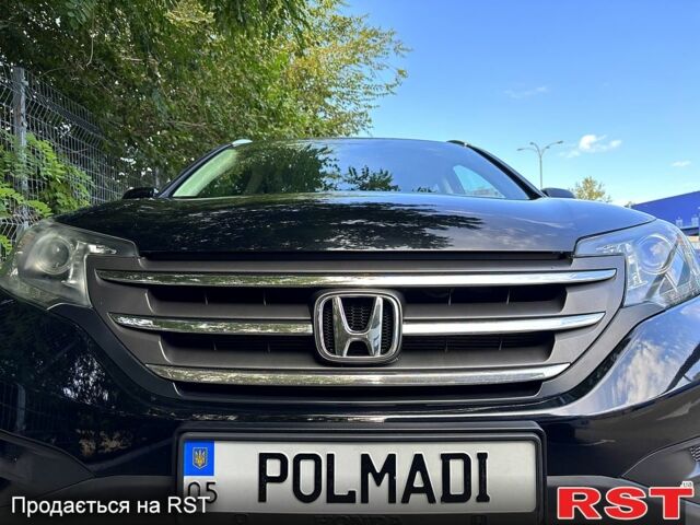 Черный Хонда СРВ, объемом двигателя 2.4 л и пробегом 153 тыс. км за 16500 $, фото 1 на Automoto.ua