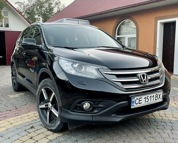 Черный Хонда СРВ, объемом двигателя 2.2 л и пробегом 170 тыс. км за 15700 $, фото 1 на Automoto.ua