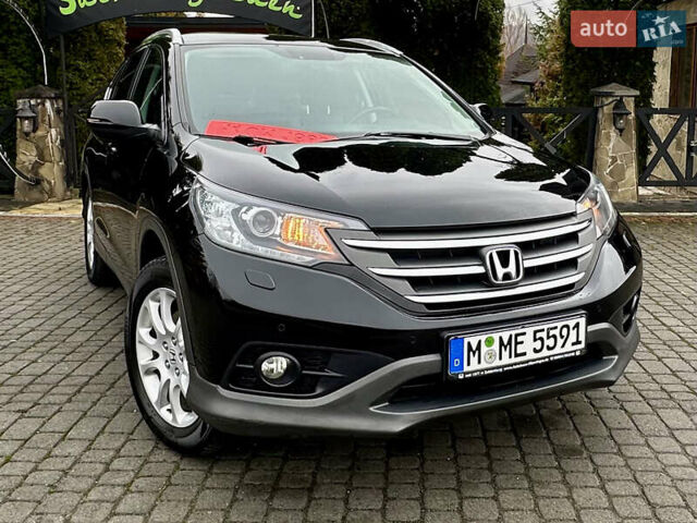 Черный Хонда СРВ, объемом двигателя 2.2 л и пробегом 207 тыс. км за 16485 $, фото 1 на Automoto.ua