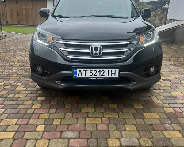 Черный Хонда СРВ, объемом двигателя 2.2 л и пробегом 225 тыс. км за 18000 $, фото 1 на Automoto.ua