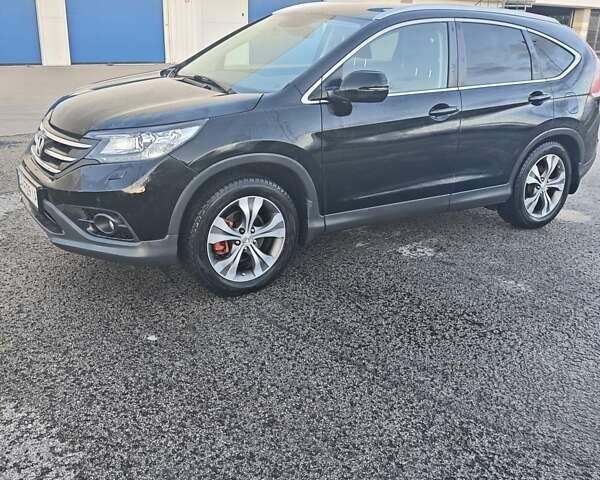 Черный Хонда СРВ, объемом двигателя 2.2 л и пробегом 220 тыс. км за 14000 $, фото 1 на Automoto.ua