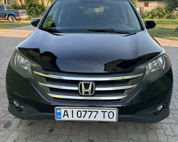 Хонда СРВ 2014 в Рава-Русская на Automoto.ua Черный Хонда СРВ, объемом двигателя 2.35 л и пробегом 214 тыс. км за 12800 $, фото 1 на Automoto.ua