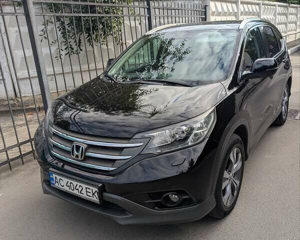 Черный Хонда СРВ, объемом двигателя 2.2 л и пробегом 260 тыс. км за 17200 $, фото 1 на Automoto.ua