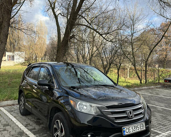 Черный Хонда СРВ, объемом двигателя 2.4 л и пробегом 197 тыс. км за 13500 $, фото 1 на Automoto.ua